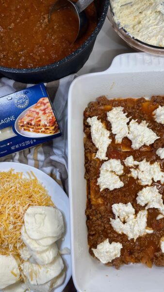 Add a layer of white sauce