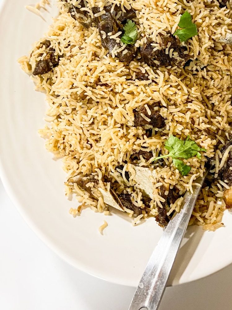 Goat pulao or pilaf on a tray