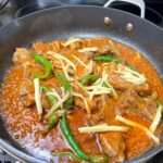 lamb cooked with salt, pepper and tomatoes