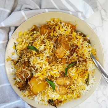 rice cooked with spices, chicken and potatoes