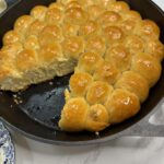 soft, warm bread with cheesy filling and slightly sweet