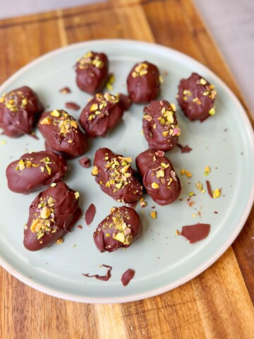 Pistachio Kunafah Stuffed dates coated with chocolate; viral dubai chocolate style