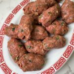 Gola Kabob is a ground beef recipe that is mixed with chopped veggies and spices and then fried