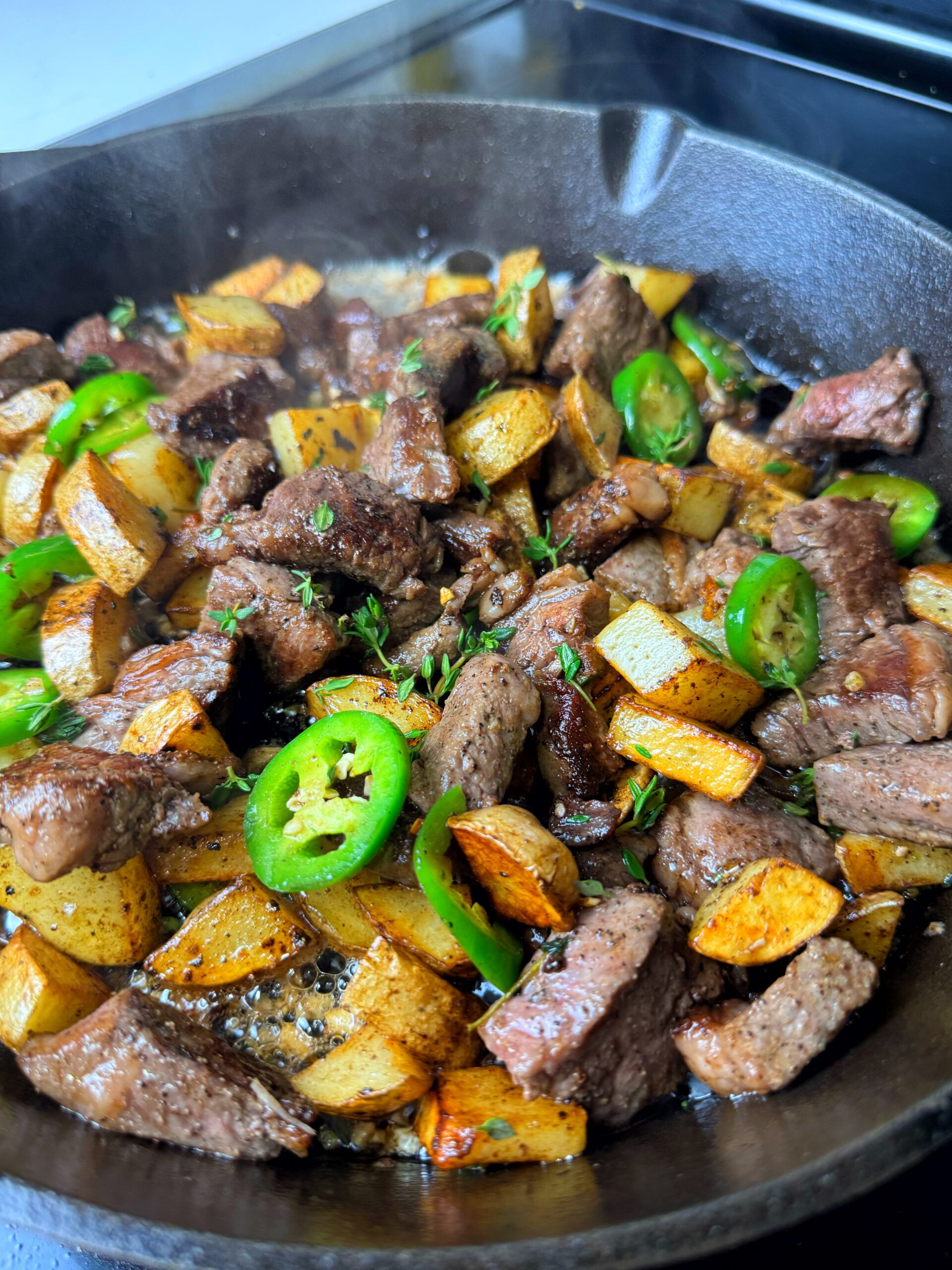 Tender steak bites cooked with butter, garlic and thyme