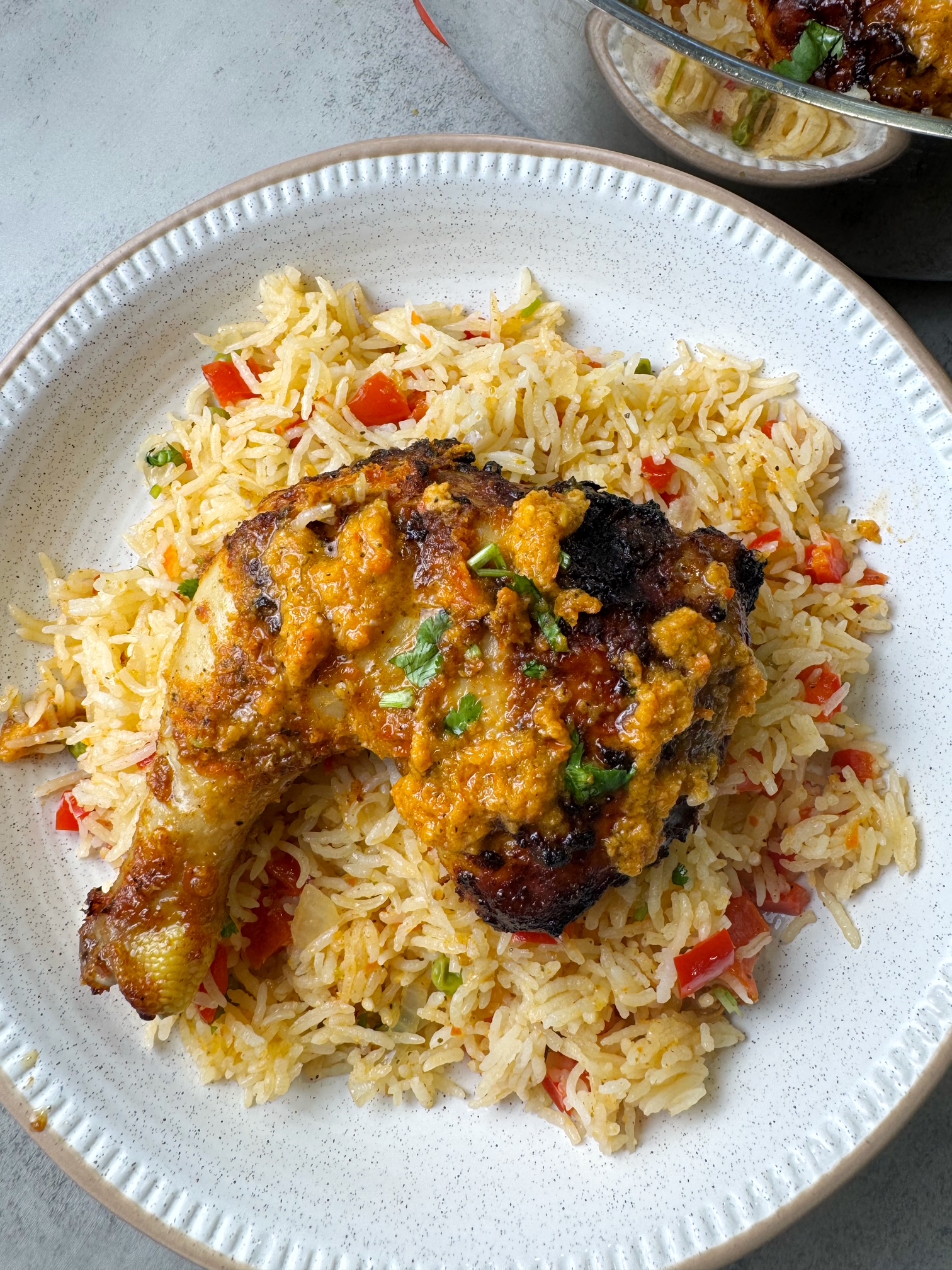 A plate of chicken and rice