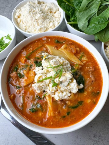 A bowl full of delicious ground beef lasagna soup