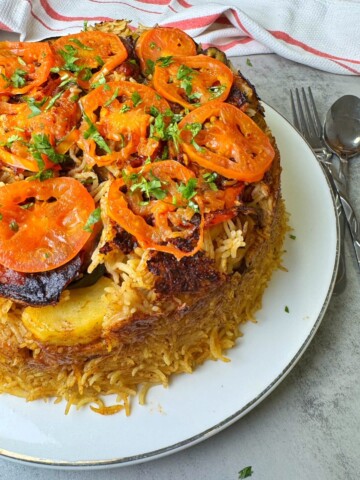 lamb maqlouba is a Palestinian native rice, meat and vegetable recipe