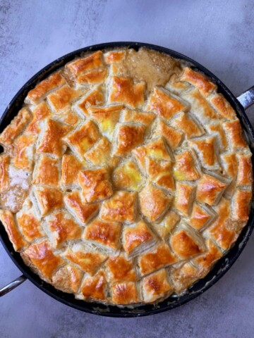 A freshly packed chicken and mushroom pie freshly out of the oven