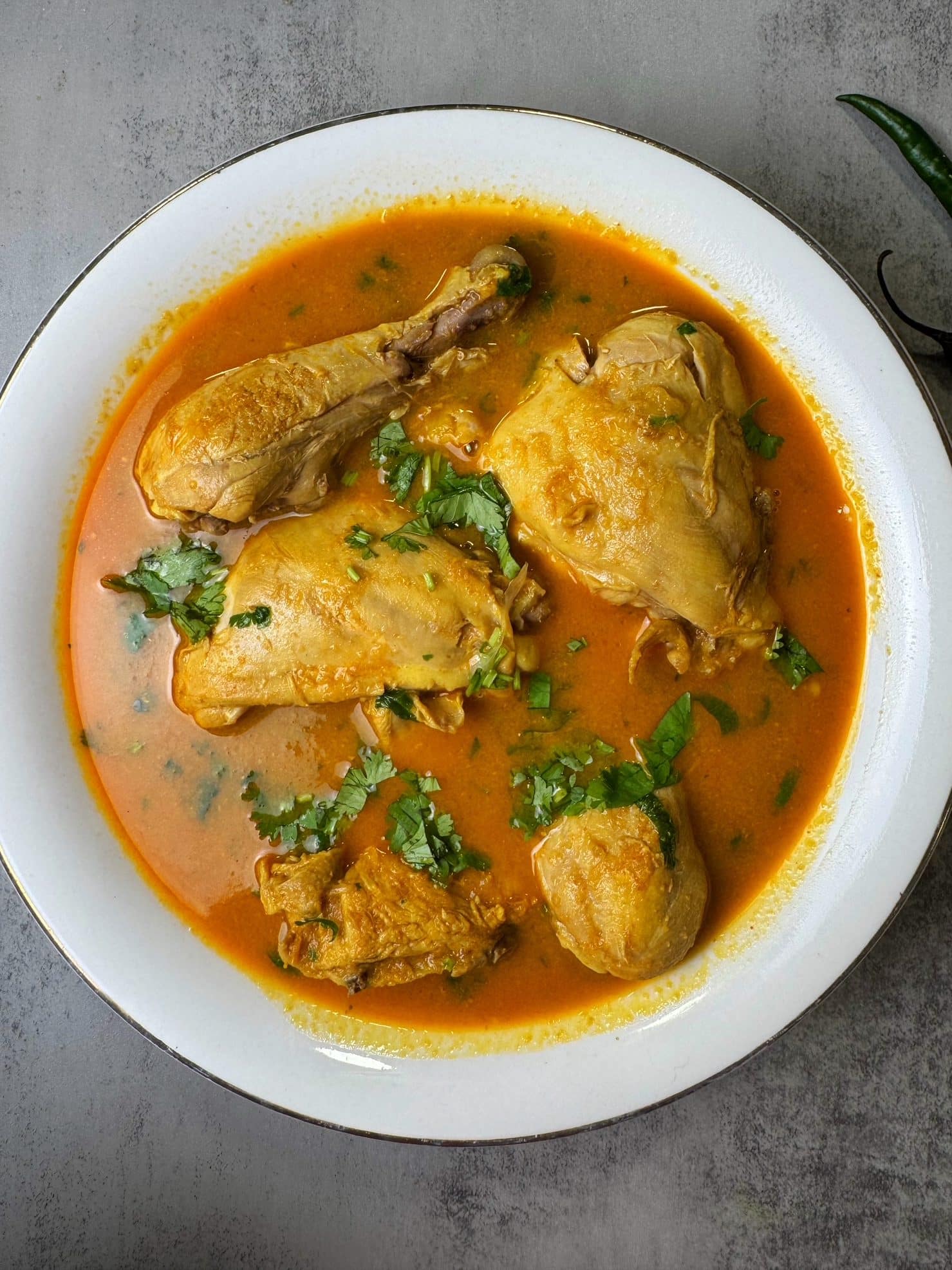 A bowl of Pakistani Style Chicken Curry made in the Instant Pot