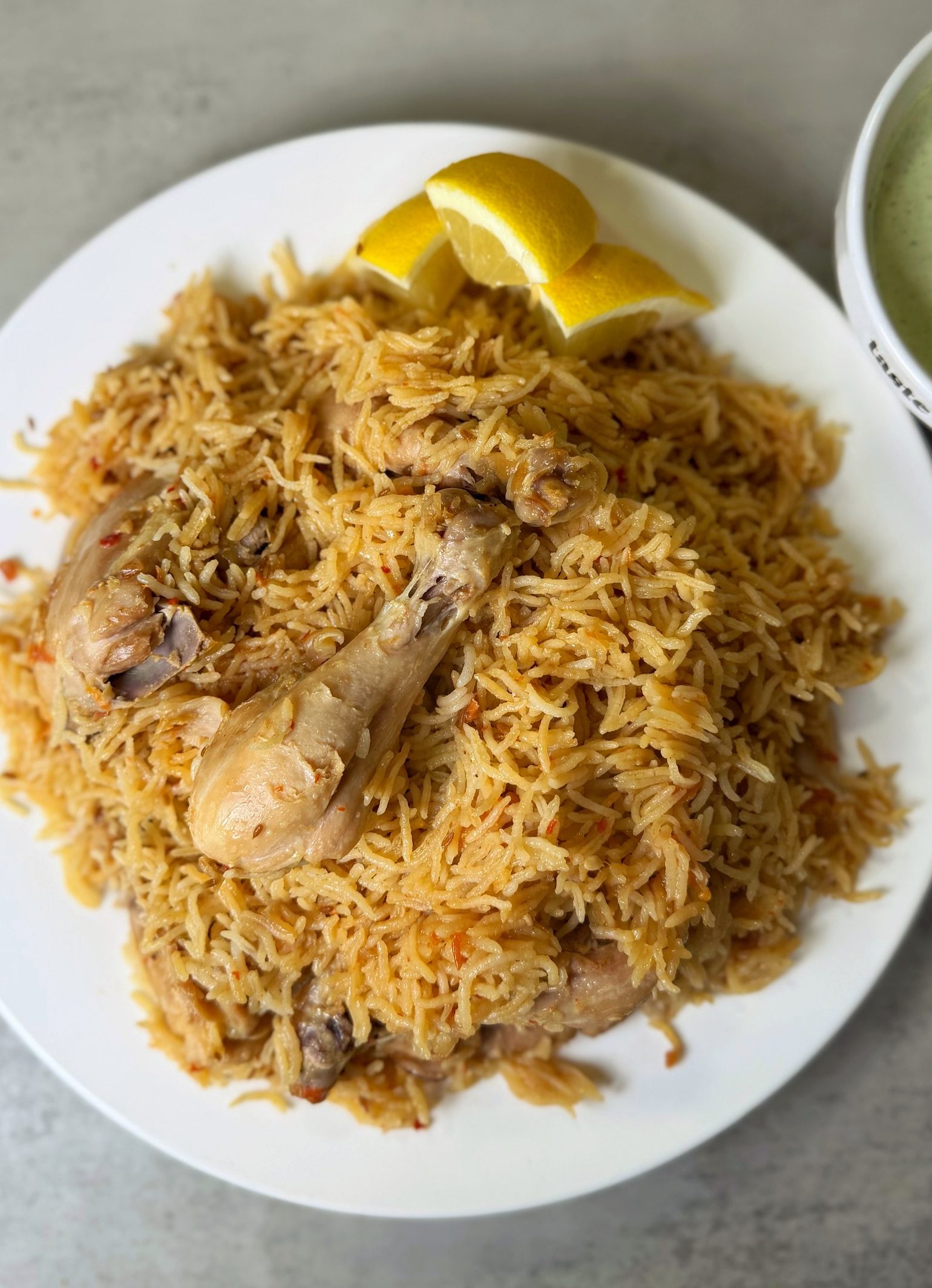 A chicken and rice dish made in the Instant Pot with minimal spices in Pakistani style