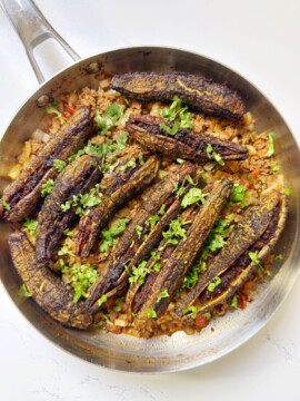 bitter gourds are stuffed with ground beef and then fried